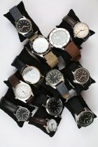 A collection of contemporary military style quartz wristwatches