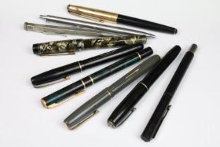 A small collection of mixed pens and fountain pens to include Parker and Waterman examples including