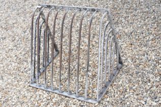 Iron wall mounting hay rack, approx 67cm wide
