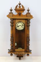 Chas L Reis, Glasgow, carved mahogany and oak wall clock, with maker's plaque, 100cm high