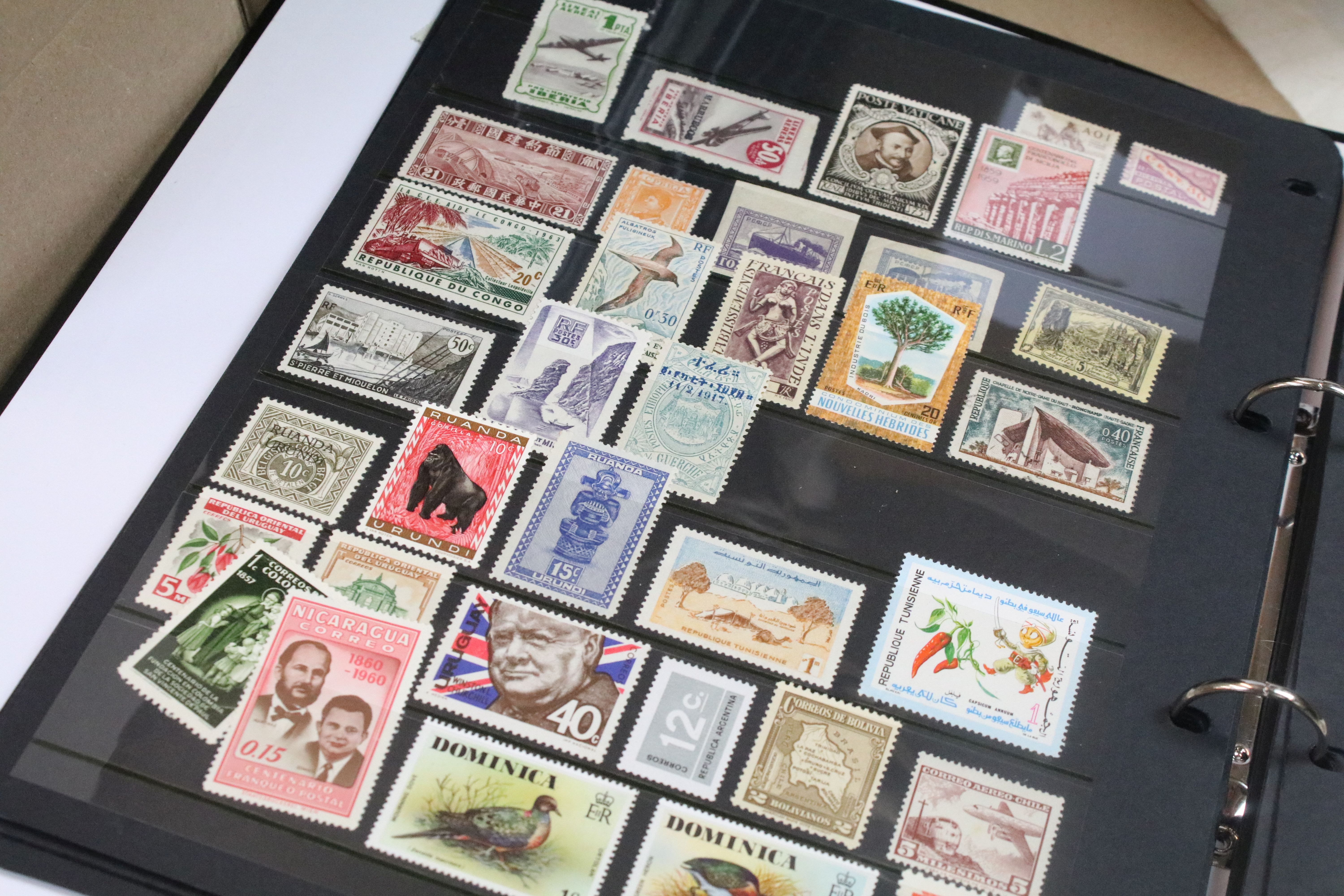 A collection of British and world stamps within albums together with loose examples - Image 17 of 20