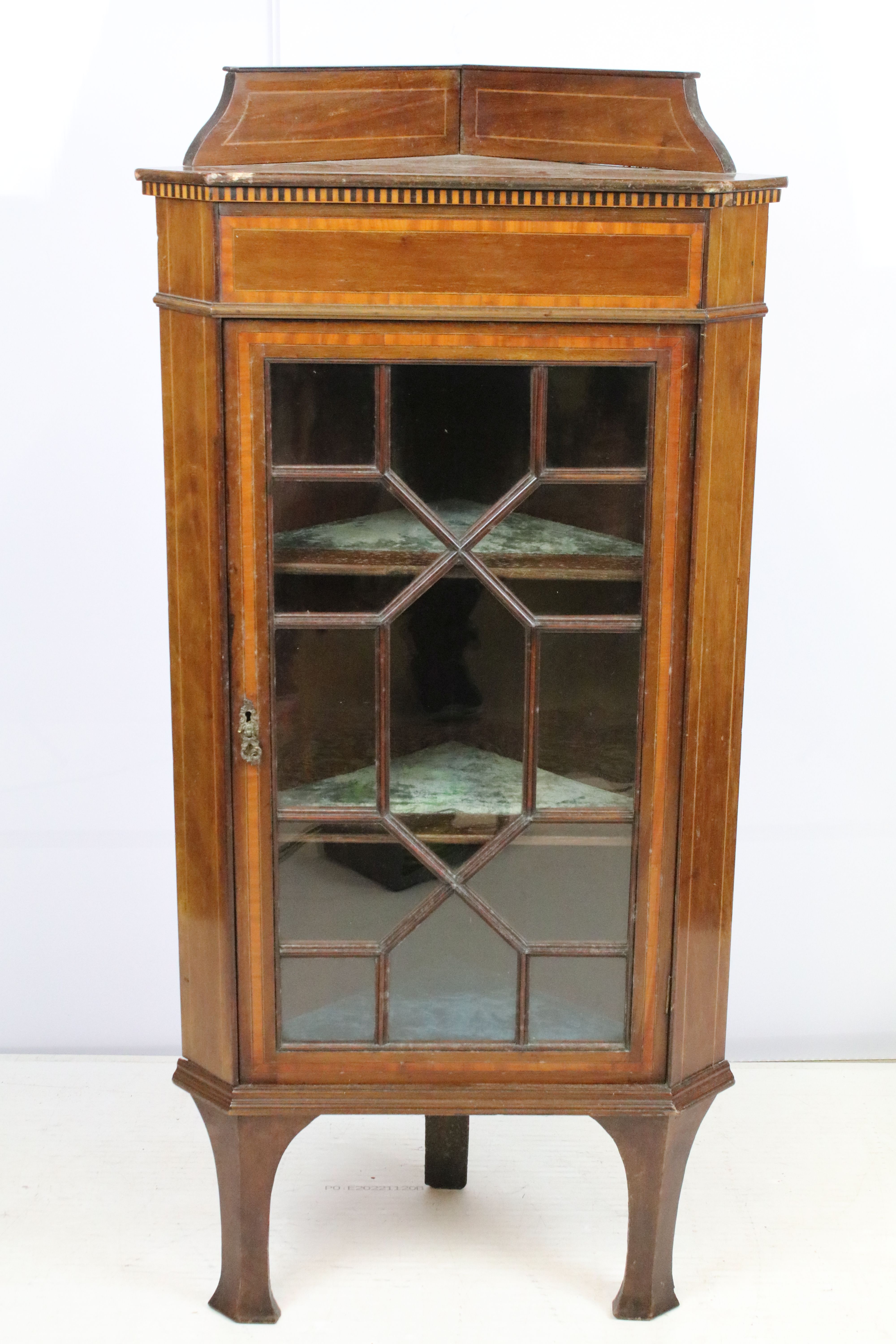 Edwardian mahogany inlaid corner display cabinet, with astragal glazed door and three fitted