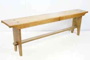 Oak refectory style kitchen bench with stretchered base on tapering legs, 44cm high x 142cm wide x