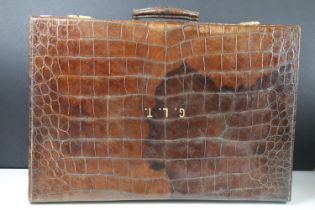 Vintage Luggage - A crocodile leather suitcase with gilt initials (approx 55cm wide), together