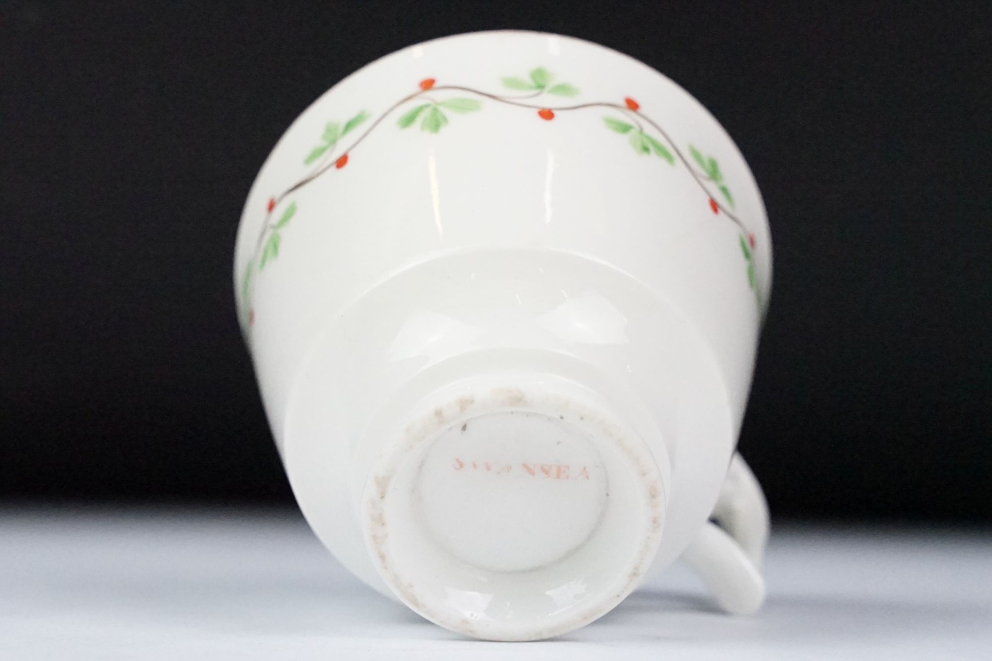Swansea pottery cup and saucer, hand painted with a floral garland, the saucer, 13.5cm diameter - Image 5 of 7