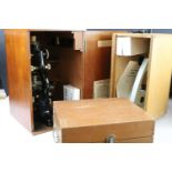 Three cased microscopes, the largest approx 33cm high with y-shaped foot, a students microscope,