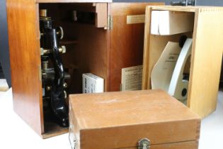 Three cased microscopes, the largest approx 33cm high with y-shaped foot, a students microscope,