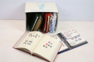 A large collection of British and world stamps within albums together with loose examples.
