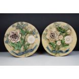 Pair of Portuguese Palissy style plates, with applied flowers and leaves, impressed mark to base '