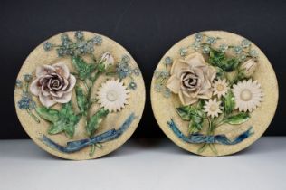 Pair of Portuguese Palissy style plates, with applied flowers and leaves, impressed mark to base '