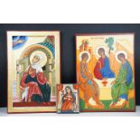 Three painted wooden religious icons to include a gilt ground example (approx 41cm x 27cm)