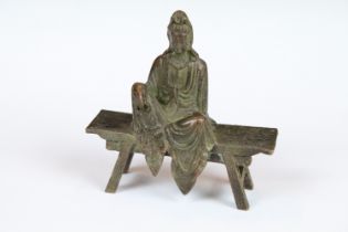A Chinese bronze of a seated Buddha, approx 8cm in height.
