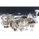 A collection of mixed silver plate to include teapot, sugar bowl, cream jug, vase, egg cups....etc..