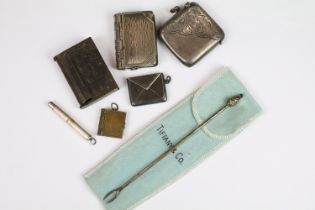 Silver vesta case, Chester 1919, a silver propelling drill, a Tiffany sterling olive fork, a