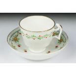 Swansea pottery cup and saucer, hand painted with a floral garland, the saucer, 13.5cm diameter
