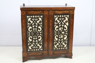 Victorian rosewood two door cupboard of small proportions, with inlaid decoration featuring leaves