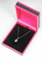 18ct white gold emerald and diamond pendant necklace