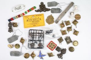 Tray of collectables to include militaria, lead tags etc