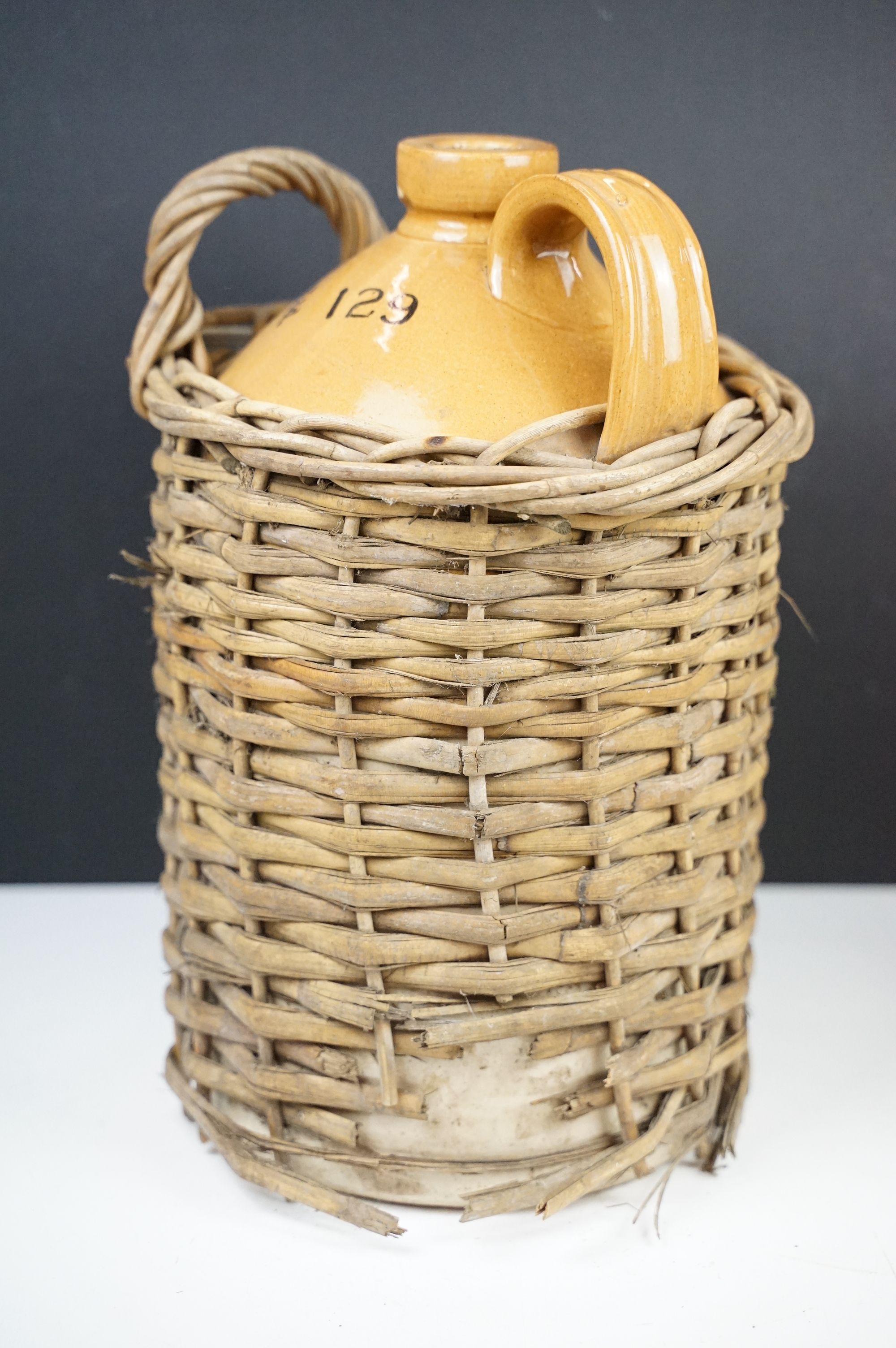 R.N. Coate & Co Ltd of Nailsea, Somerset - A stoneware cider flagon housed within a wicker - Image 3 of 10