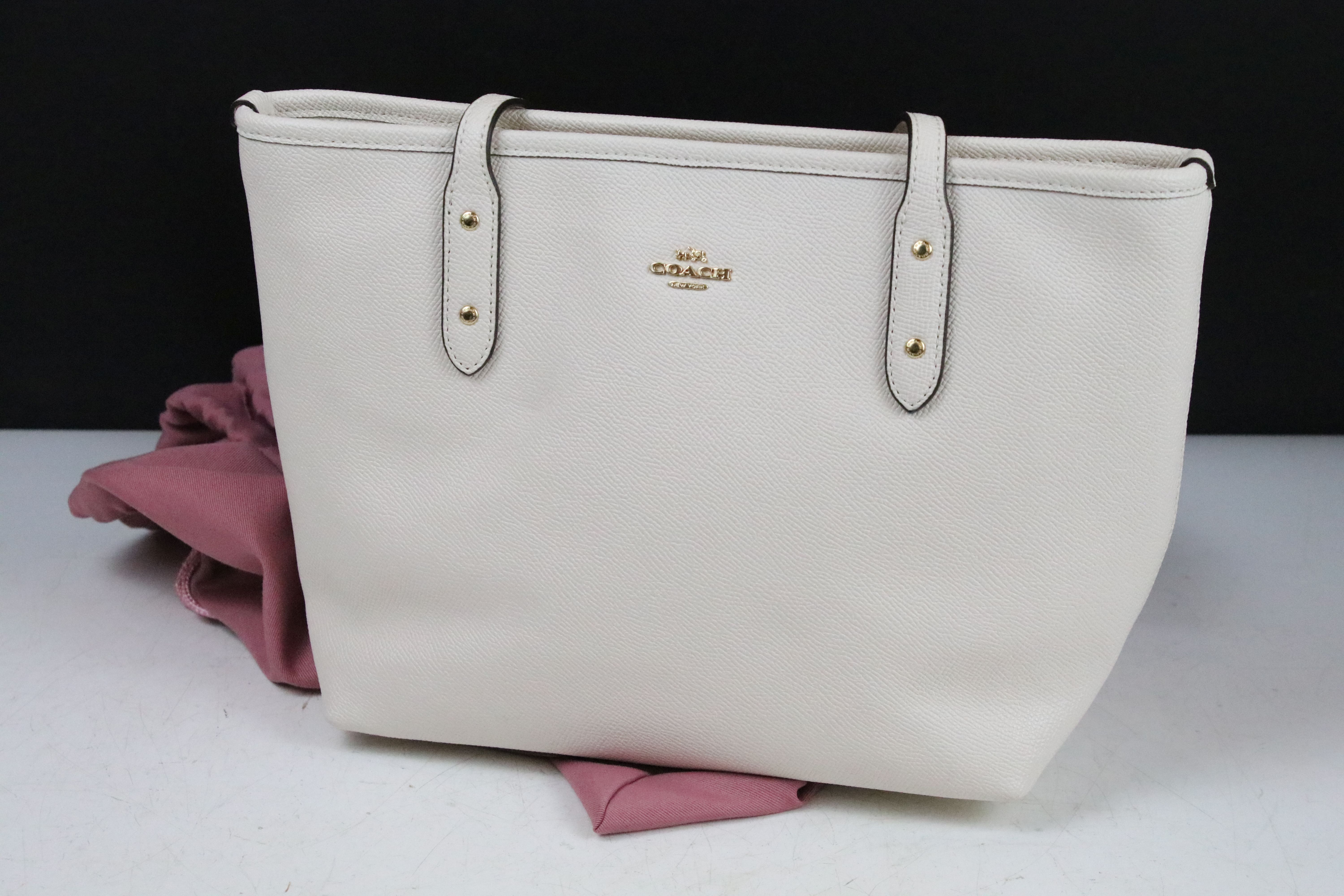 Two Radley handbags to include a black leather handbag and a pink example, both housed within pink - Image 4 of 9