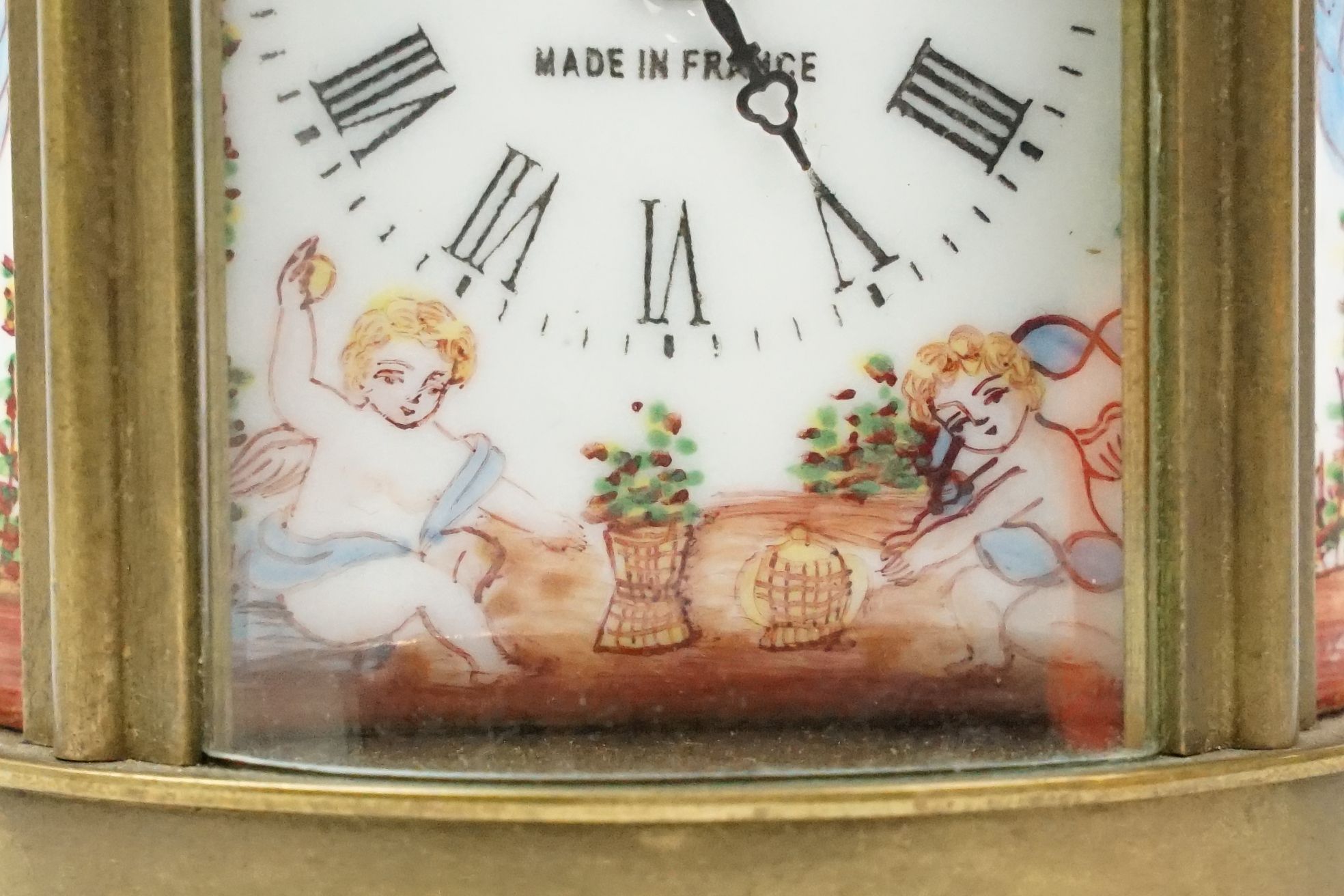 An antique French miniature carriage clock, brass cased with beveled glass panels, decorative Cherub - Image 3 of 10