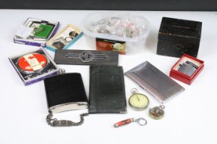 A small group of mixed collectables to include coins, car badges, pocket lighter and a World War Two