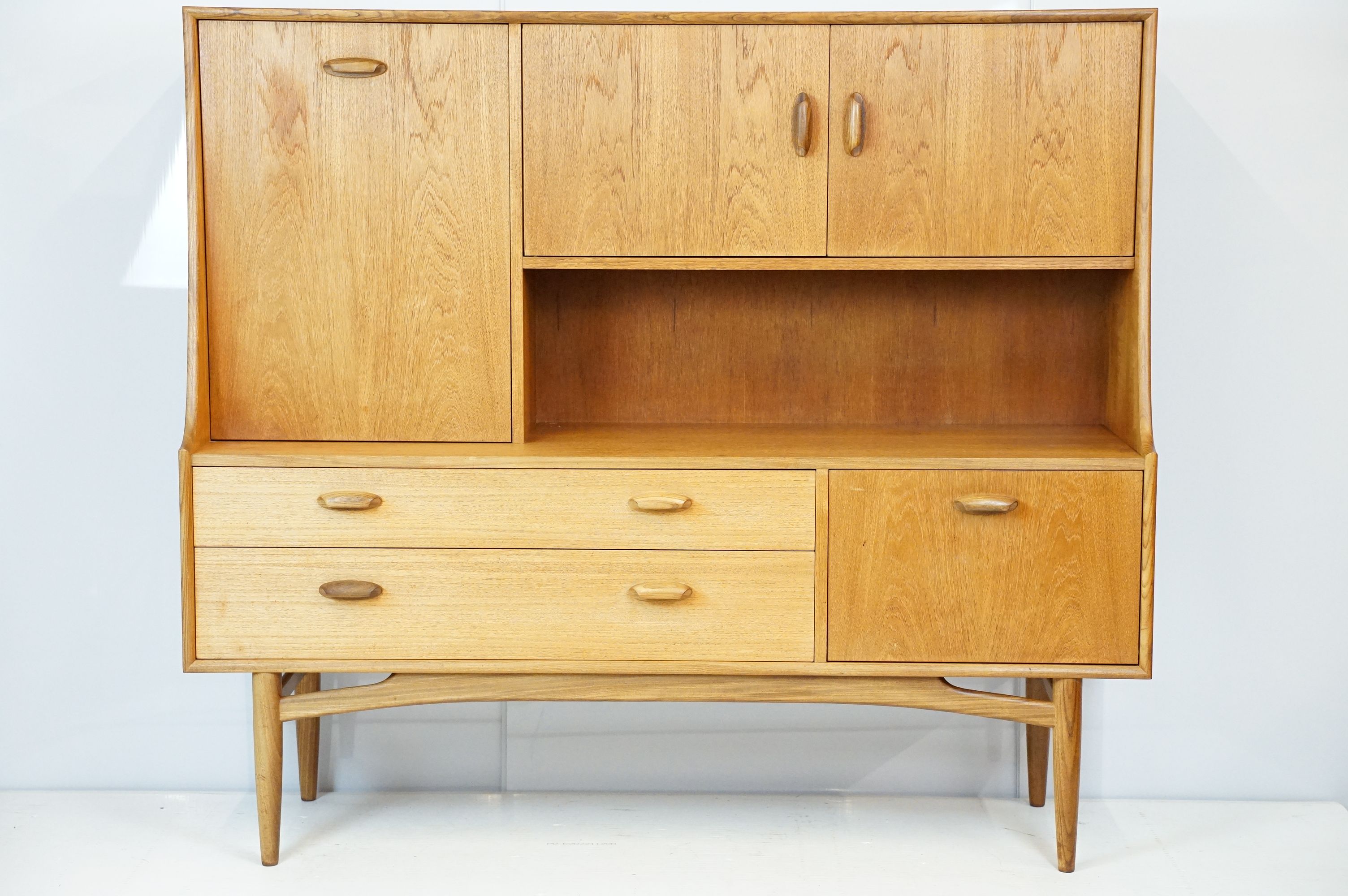 G Plan teak sideboard, with cupboards above two long drawers and a further cupboard, with maker's