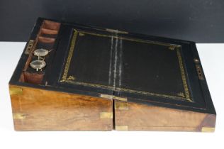 Victorian brass bound walnut writing slope with vacant brass inlay to lid, opening to an interior