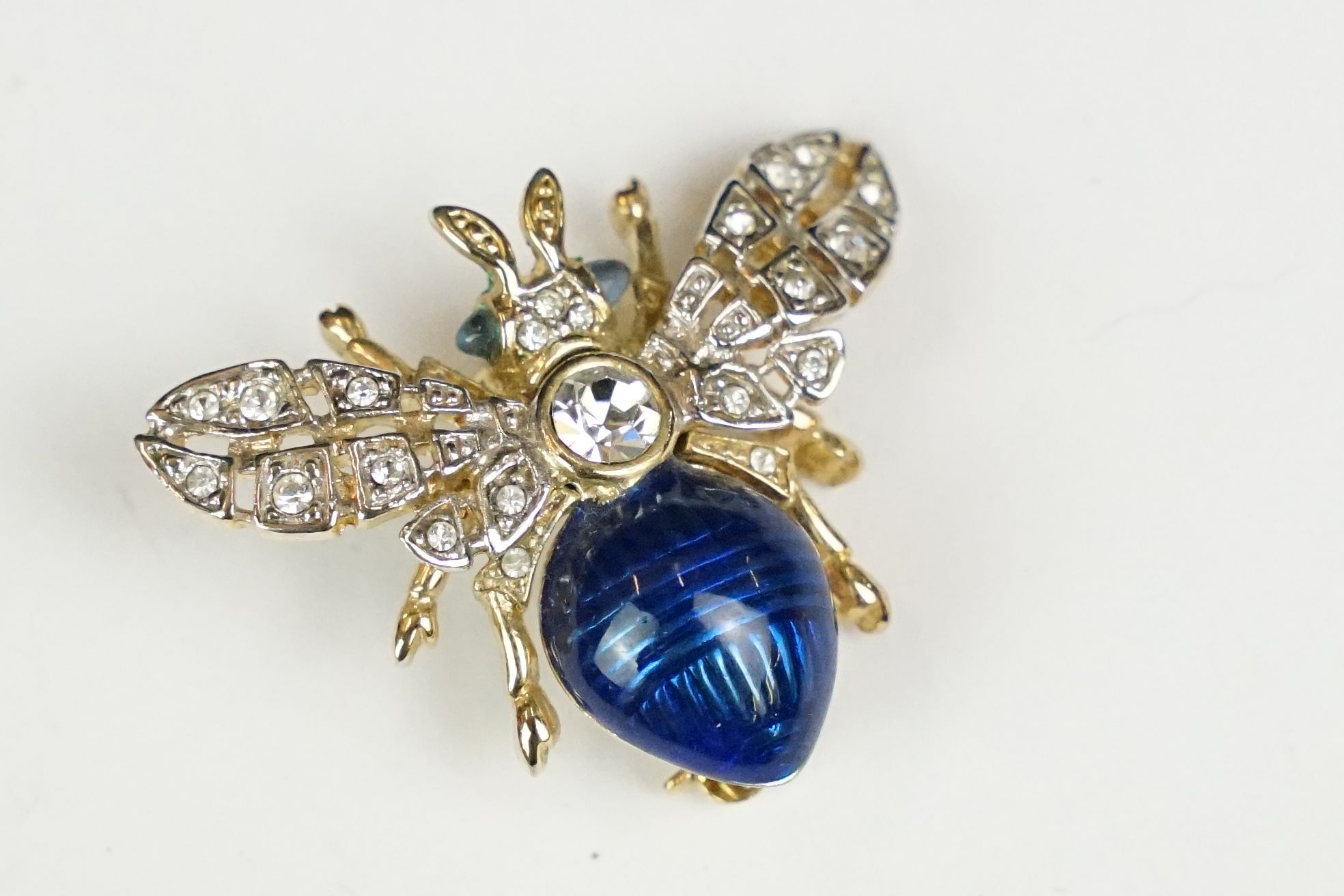 Gilt bee brooch with diamonte and glass body and eyes