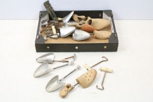 Pair of wooden shoe lasts, aluminium shoe lasts, boot pulls and riding spurs