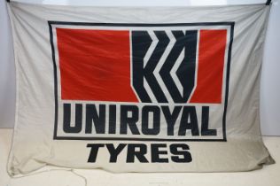 Advertising - A large Uniroyal Tyres advertising flag / wall hanging having a large printed logo,
