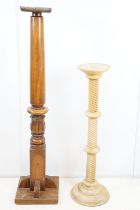 Early 20th century mahogany jardiniere / torchere stand, 132cm high together with another jardiniere