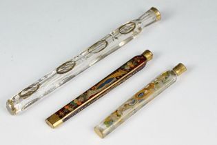 Three antique continental glass scent bottles of elongated form, with hand painted & gilt