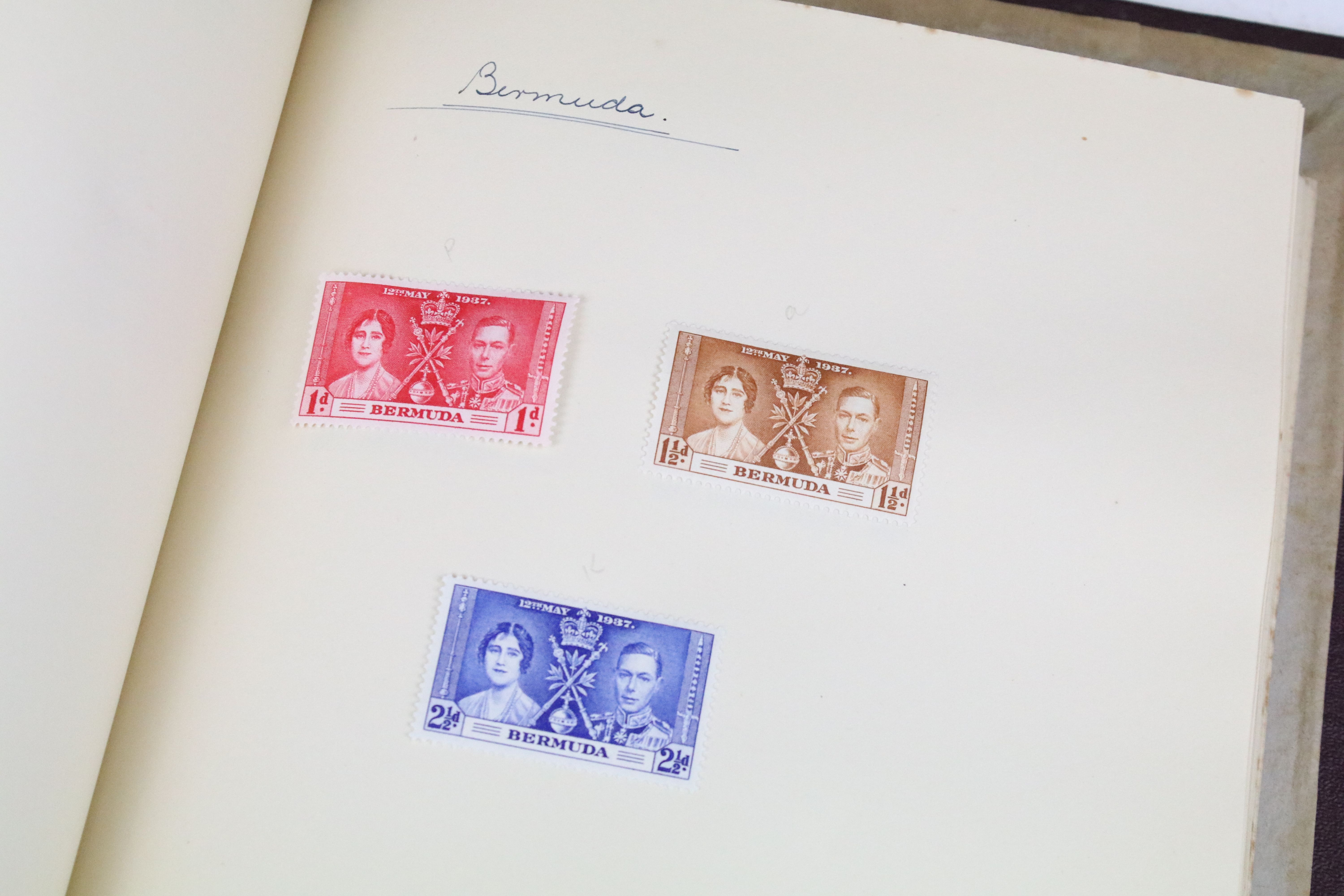 A stamp album containing stamps marking the silver jubilee of King George V from the UK and - Image 9 of 18