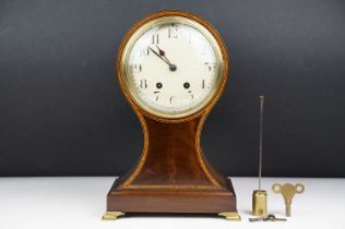 Early 20th century inlaid mahogany balloon form mantel clock, raised on four gilt metal bracket