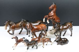 Collection of horse figurines to include four Beswick examples. tallest measures 27cm tall.