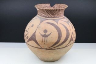 Chinese Neolithic painted terracotta vase having a tapering body with a flared rim and painted
