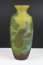 Galle Tip cameo glass vase having a yellow ground with a peacock in landscape design. Signed tip