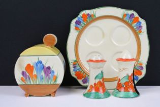 Collection of Clarice Cliff to include a crocus pattern cruet plate and preserve jar (preserve jar