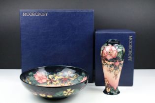 Two Moorcroft vases to include a Oberon pattern vase and a Oberon pattern bowl. Both in Moorcroft