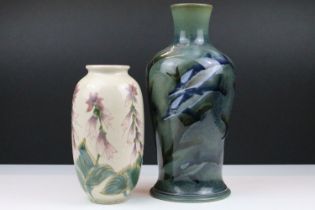 Two Cobridge stoneware vases to include a dolphin pattern vase (signed RW to base with impressed