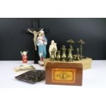 Selection of small brass candlesticks together with religious objects including two Virgin Mary