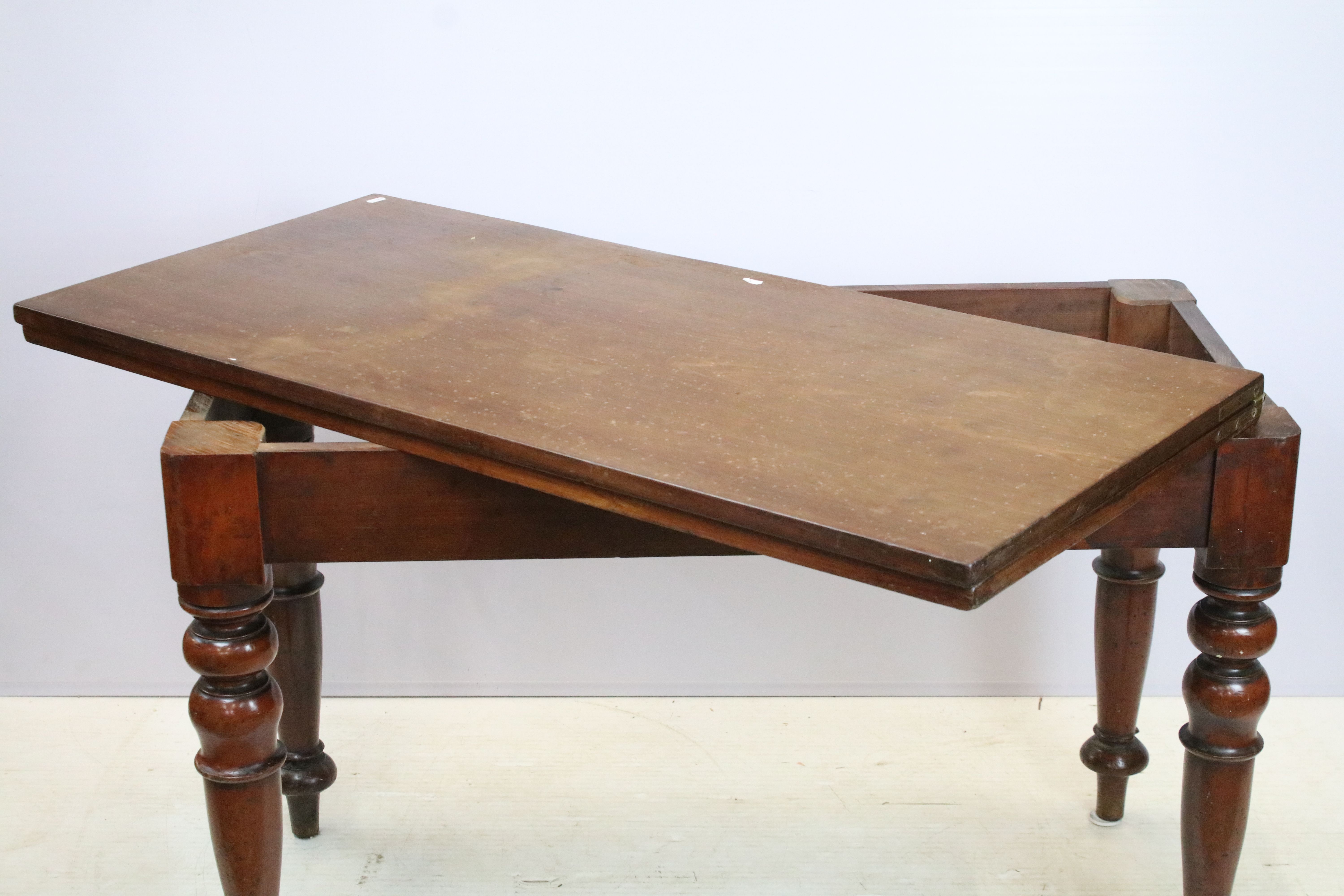 19th Century Victorian fold top dining table. The square top being raised on a turned legs with a - Image 3 of 7