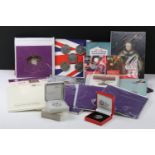 A collection of mainly Royal Mint coin collectors packs to include annual year sets, 50p, £2 and