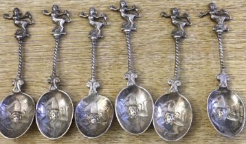 Matching set of antique Asian silver tea spoons with decorative bowls with 3 running legs and