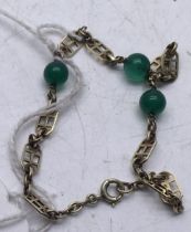 14 carat gold Jade necklace with 3 small Jade beads 4.8 grams Hallmarked gold 14 carat