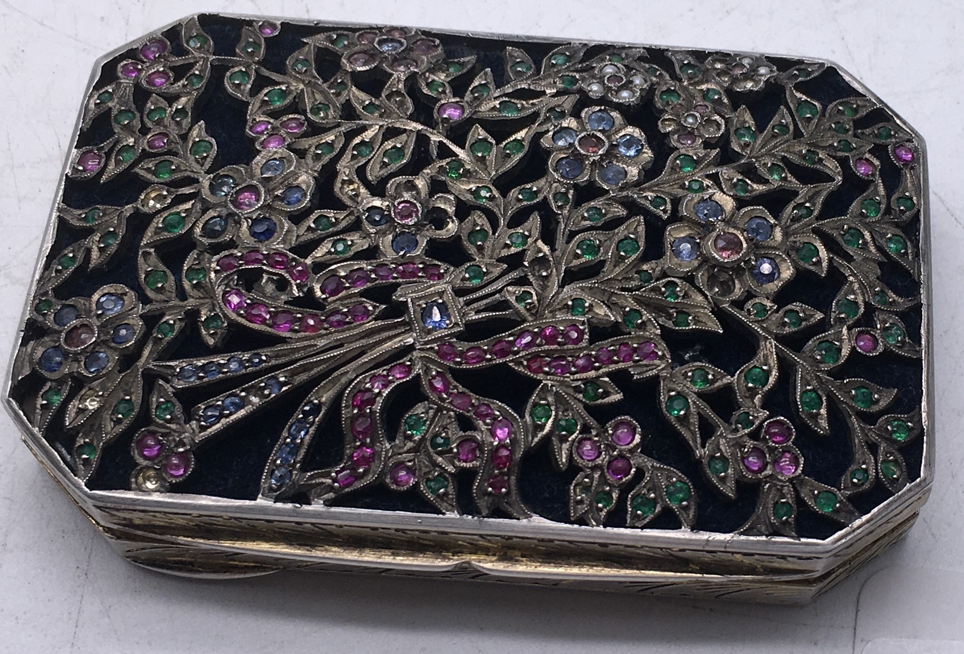 Edwardian period Silver and gilt gem set Ladies compact 3inches long and 2inches deep the top