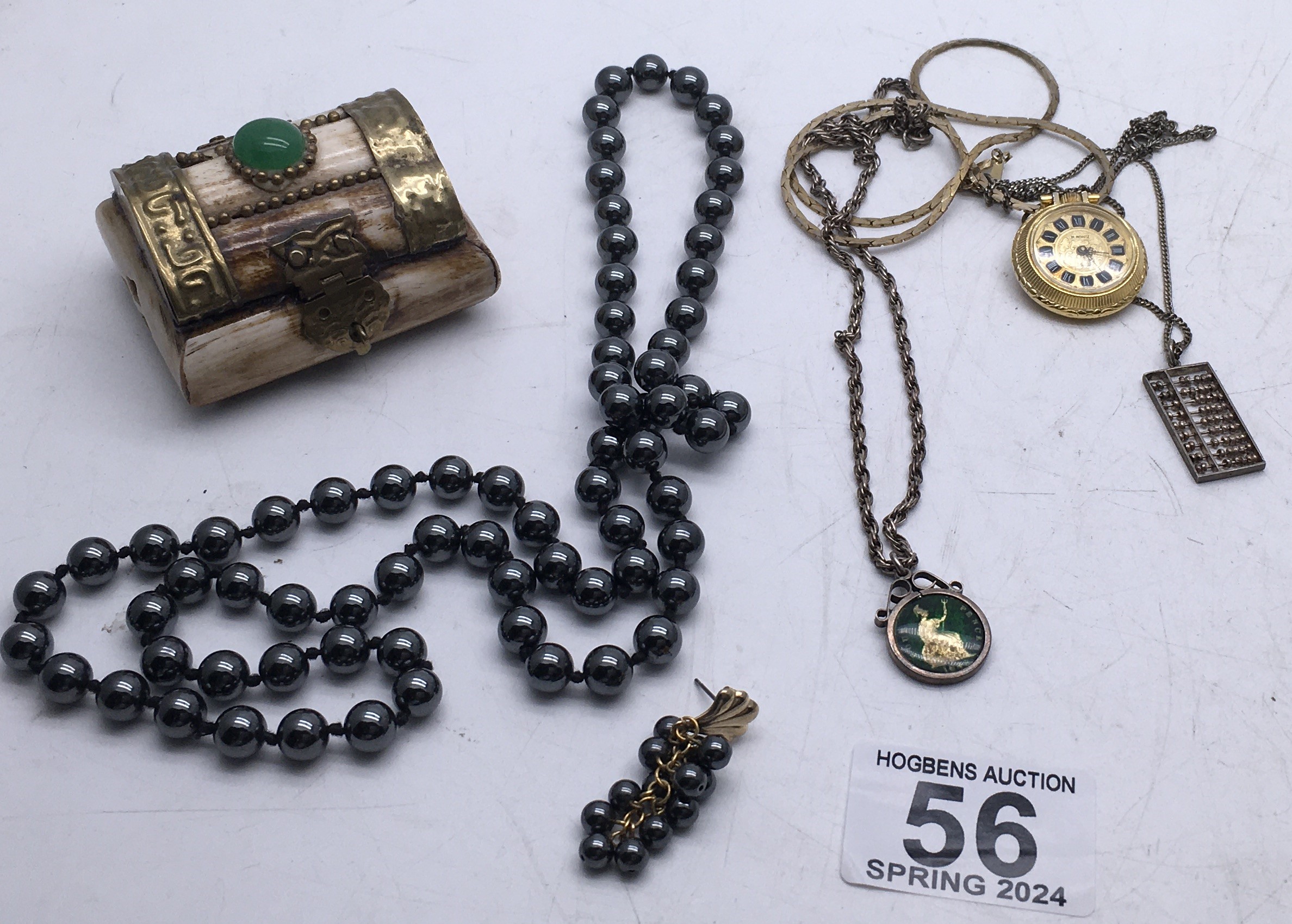 4 items including decorative watch and chain, silver chain with abacus attached