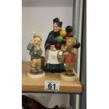 2 x Hummel figurines and 1 Doulton figurine Balloon seller