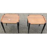 2 black and teak matching mid 20 th century small coffee tables